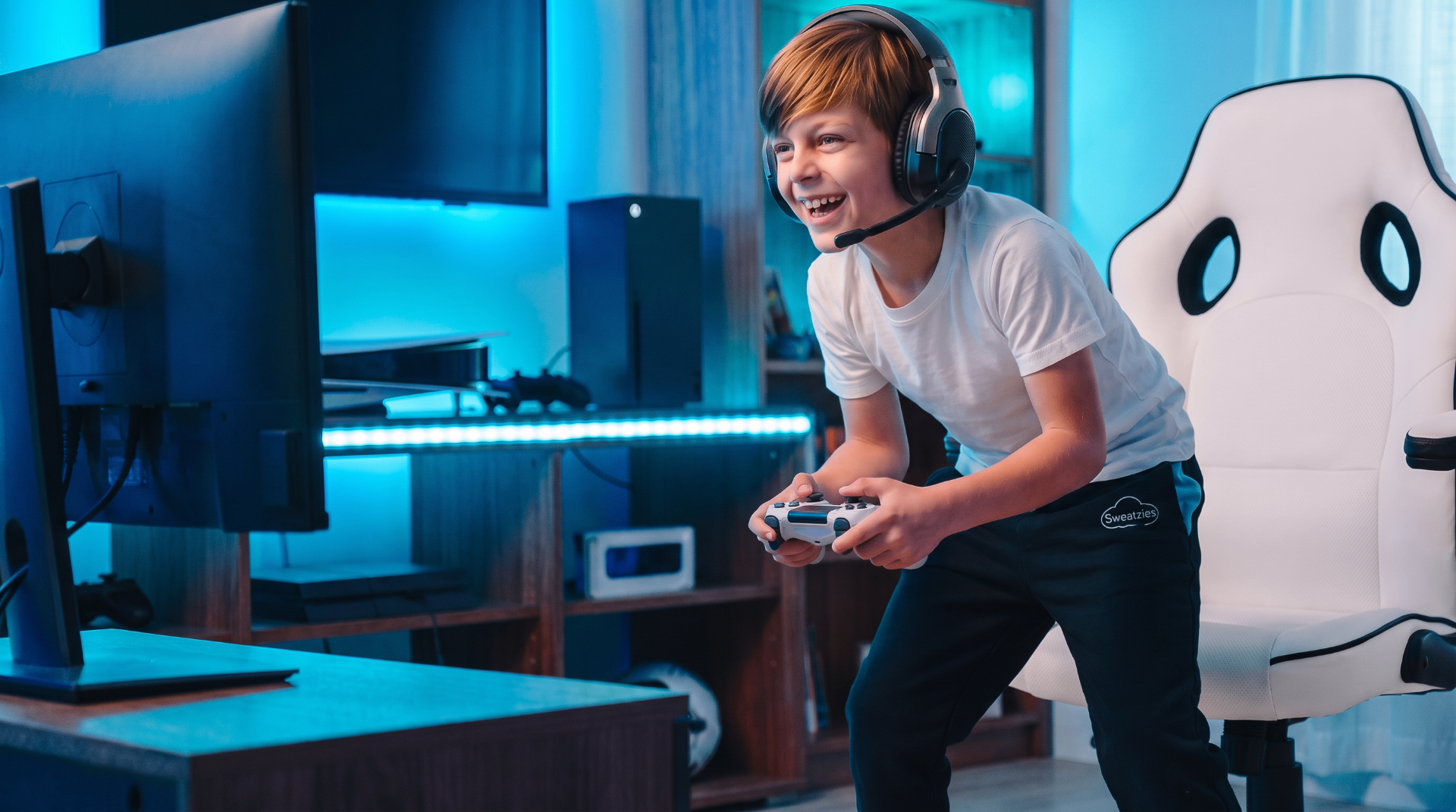Kid standing up mid-game wearing Sweatzies